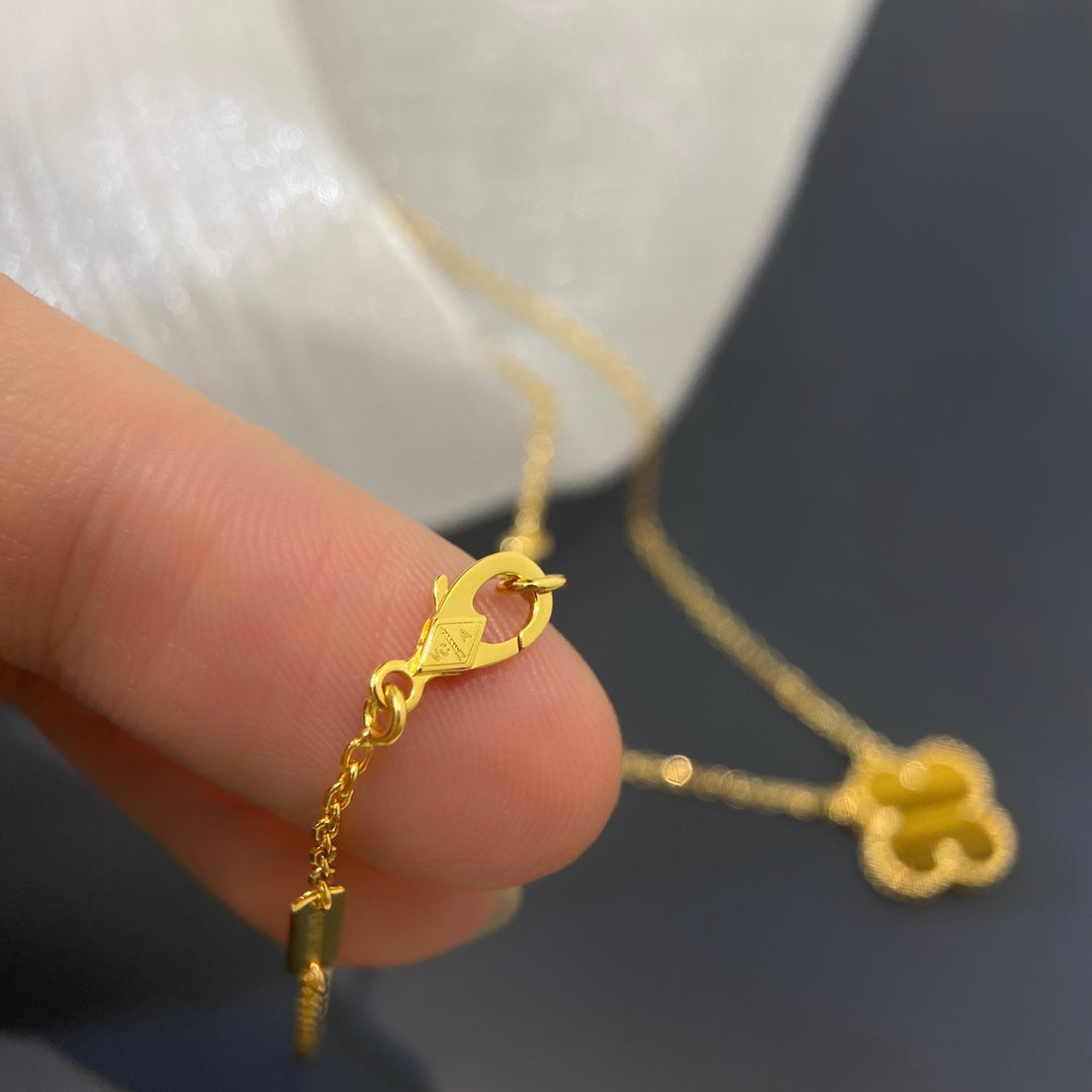 Quatrefoil Pendant Necklace, Yellow Gold Tone